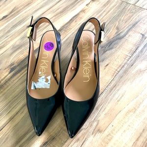 Shiny black elegant shoes.